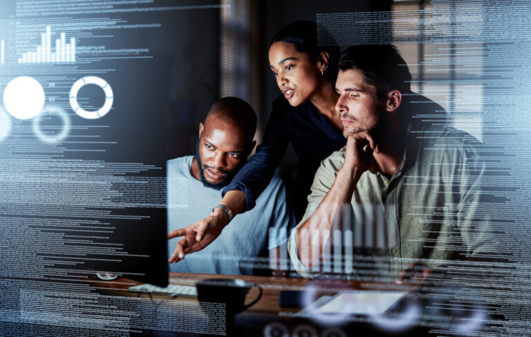 IT professionals discussing business programs in an office as they provide reliable IT support in Jacksonville businesses.