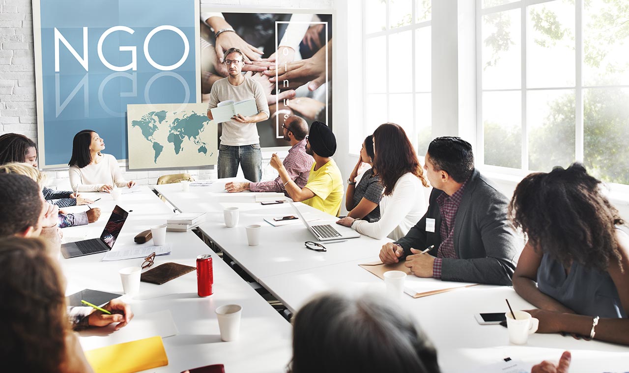 NGO Contribution Corporate Foundation Nonprofit Concept non governmental organization employees working together