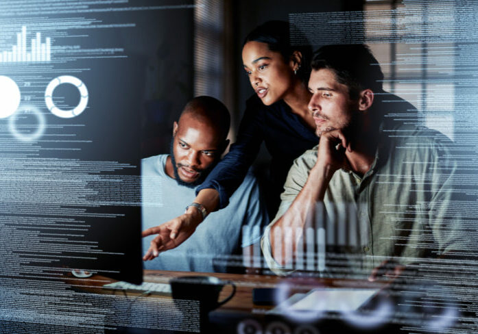 IT professionals discussing business programs in an office as they provide reliable IT support in Jacksonville businesses.